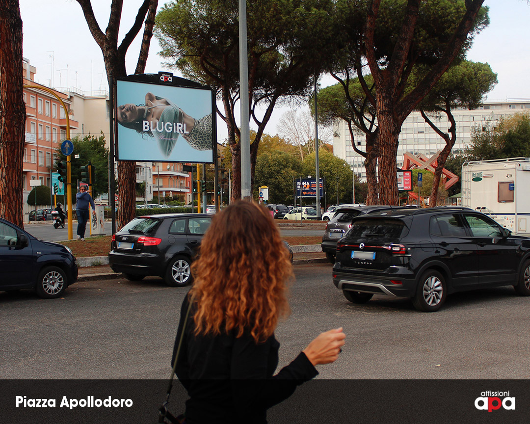 Affissione 3x2 di APA in Piazza Apollodoro a Roma con pubblicità Blugirl su poster in vinile.