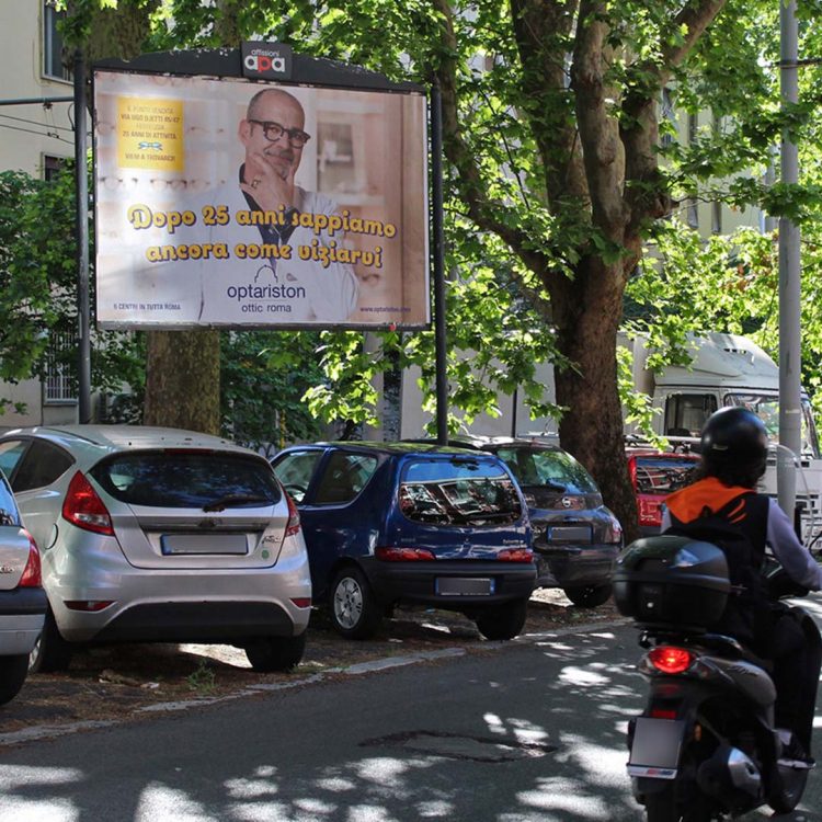 Poster per la pubblicità esterna su Via delle Isole Curzolane a Roma.
